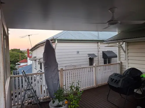From an uneven deck , I've replaced all the old joists and adjusted each of them to make the deck straight . Replace the old balustrades with new ones and added an insulated roof with a fan and a light integrated .