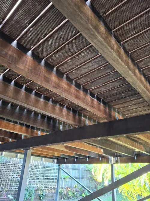 From an uneven deck , I've replaced all the old joists and adjusted each of them to make the deck straight . Replace the old balustrades with new ones and added an insulated roof with a fan and a light integrated .
