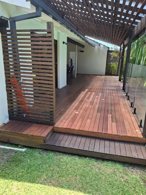 Deck repair for this house in westlakes -2 joists have been replaced 1 has been eaten by termites and another one had been damaged by the weather . -A timber support has been installed on the dirt and created a termite acces , that timber has been removed and replaced with steel brackets 200mm from the dirt . -The damaged boards have been replaced with new kwila decking boards