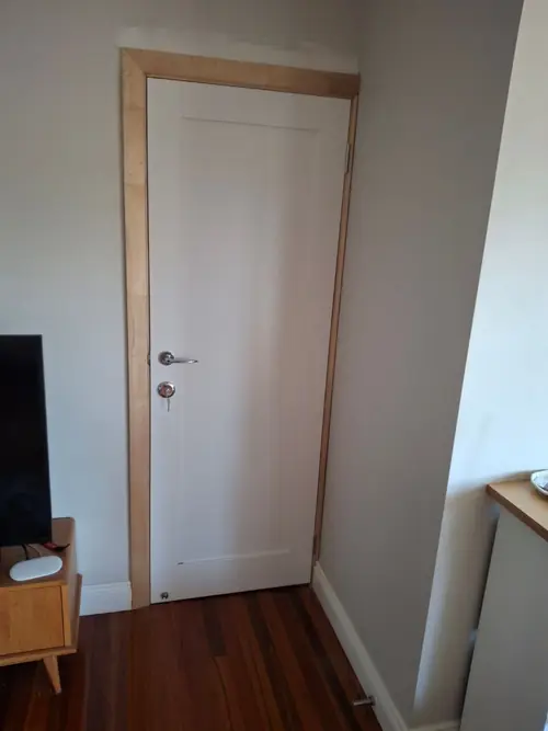 This was just an opening to access to the office and I Installed a swing door to give some privacy and install a deadbolt to secure important files.