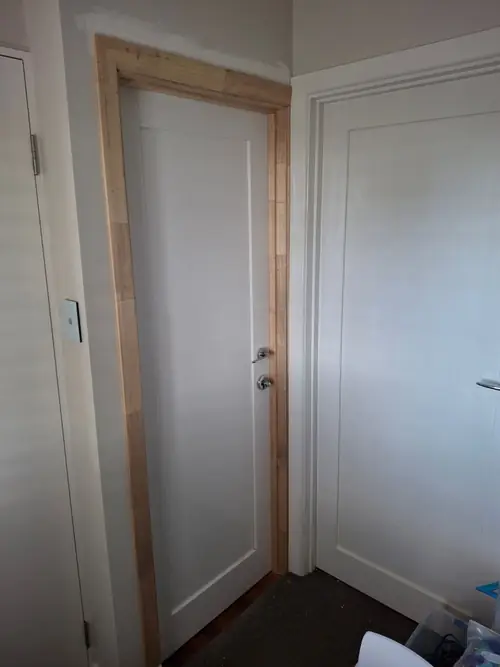 This was just an opening to access to the office and I Installed a swing door to give some privacy and install a deadbolt to secure important files.