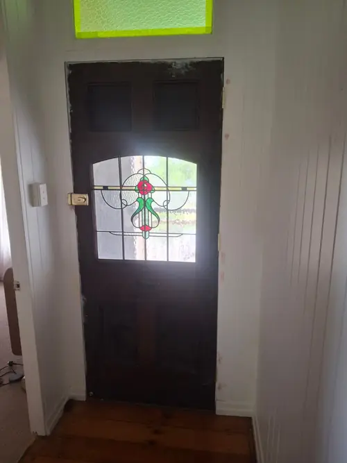 This door was too wide and too small in lengths to fit the existing opening . The deadbolt , Handle and hinges were the other way around . The door has been cut