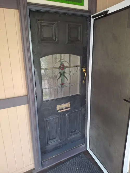 This door was too wide and too small in lengths to fit the existing opening . The deadbolt , Handle and hinges were the other way around . The door has been cut on each side and at the top to