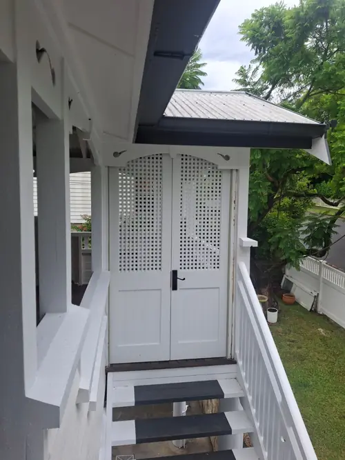 Installation of new lattice doors with new hardware. The old frame has been modified / adjusted to be square and plumb .