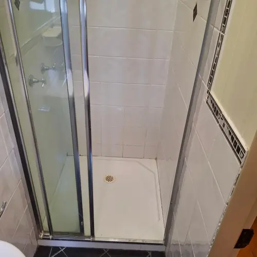 2 bathrooms renovated: The ensuite was 900mm wide, We demolished the wall to extend it to 1200mm