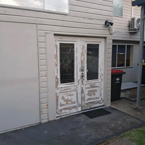 New entry door and hardware. The ground floor has been re framed to be 70mm of the ground with a termite barier. The concrete outside has be demolished by others as there was no step down from inside to outside.