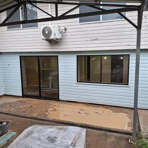 Last part of this job. Installation of a new door and a new window with customised reveals. We've built a double walls to hide the bricks. The walls have been insulated, a termite barrier has been installed and new chamfer boards have been installed