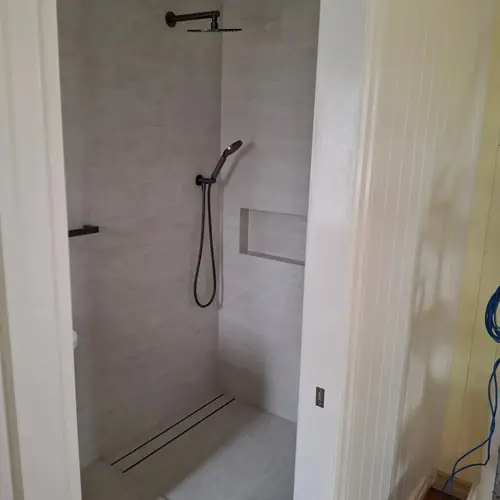 2 bathrooms renovated: The ensuite was 900mm wide, We demolished the wall to extend it to 1200mm