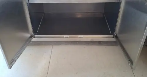 We've built an external kitchen with a steel frame, cement sheet (easylap) cladding for the tiles. We've installed the stainless steel doors, drawers, rubbish bin and shelves.