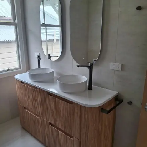 2 bathrooms renovated: The ensuite was 900mm wide, We demolished the wall to extend it to 1200mm