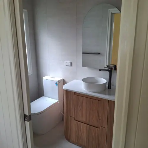 2 bathrooms renovated: The ensuite was 900mm wide, We demolished the wall to extend it to 1200mm