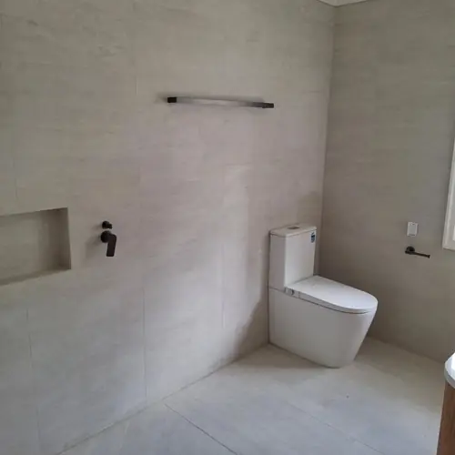 2 bathrooms renovated: The ensuite was 900mm wide, We demolished the wall to extend it to 1200mm