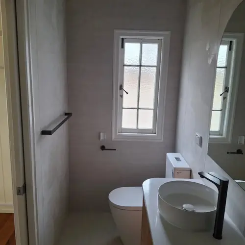 2 bathrooms renovated: The ensuite was 900mm wide, We demolished the wall to extend it to 1200mm