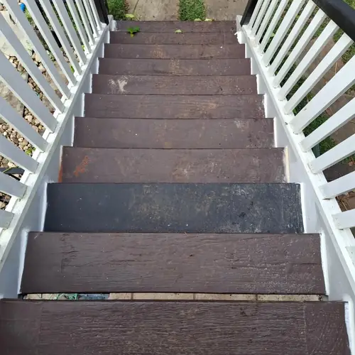 Replacement of a deck with it's structure. All the joist have been replaced with f14 hardwood painted with 1 coat of dulux primer and 2 coats of dulux weathershield prior to be installed. The decking boards are kwila. We also replaced a step and a post on the stair.