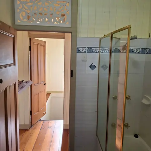 2 bathrooms renovated: The ensuite was 900mm wide, We demolished the wall to extend it to 1200mm