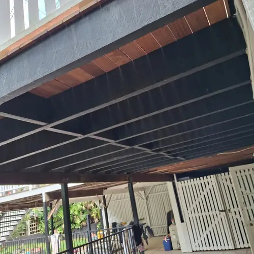 Replacement of a deck with it's structure. All the joist have been replaced with f14 hardwood painted with 1 coat of dulux primer and 2 coats of dulux weathershield prior to be installed. The decking boards are kwila. We also replaced a step and a post on the stair.