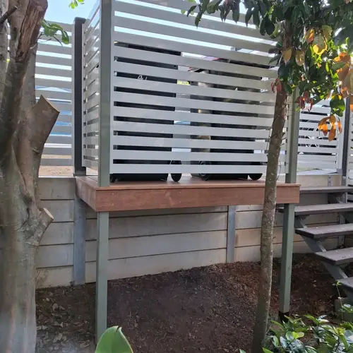 We've built a platform for the bins at the front of this house to be more practical as they used to be in the garage with a steep driveway.
