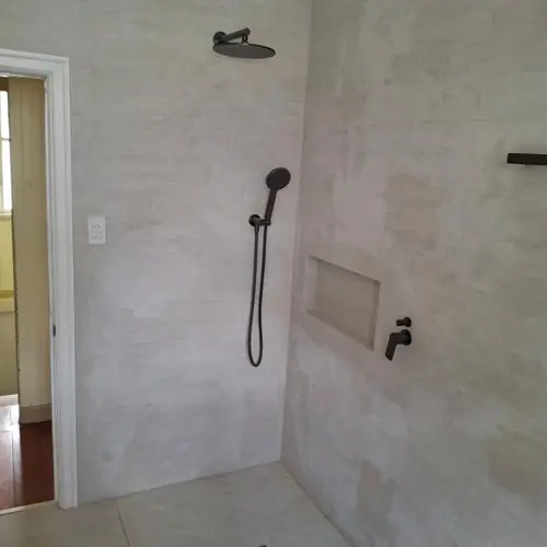 2 bathrooms renovated: The ensuite was 900mm wide, We demolished the wall to extend it to 1200mm