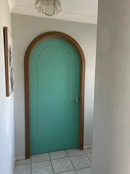 Installation of 2 curved doors to create a new bedroom