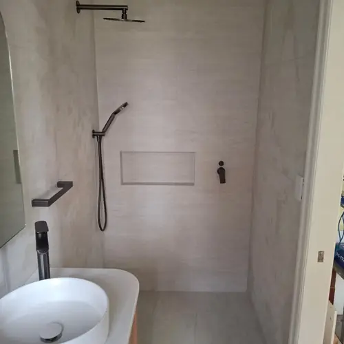 2 bathrooms renovated: The ensuite was 900mm wide, We demolished the wall to extend it to 1200mm