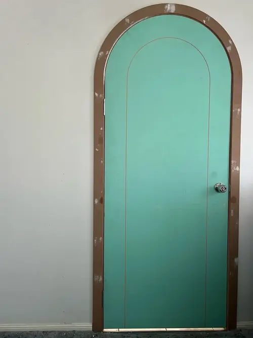 Installation of 2 curved doors to create a new bedroom